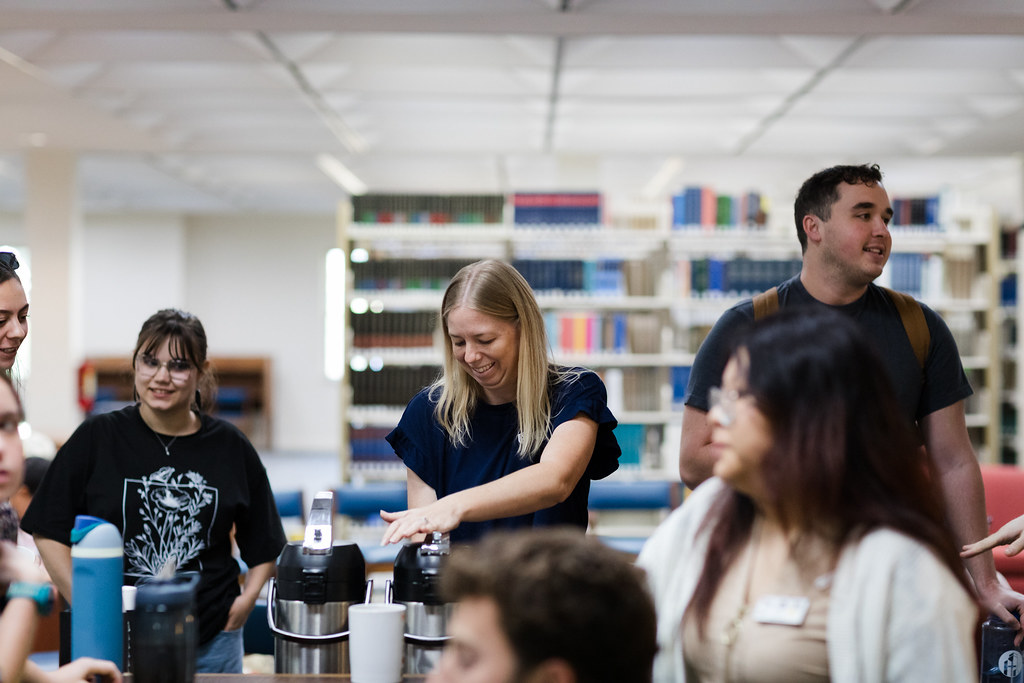 professors and students enjoying coffee and conversation